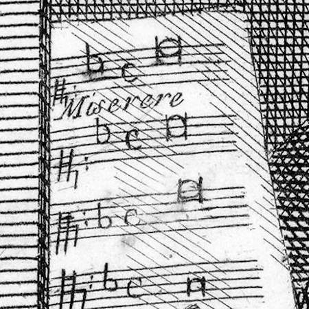 Zoomed image of the score Allegri holds in his portrait